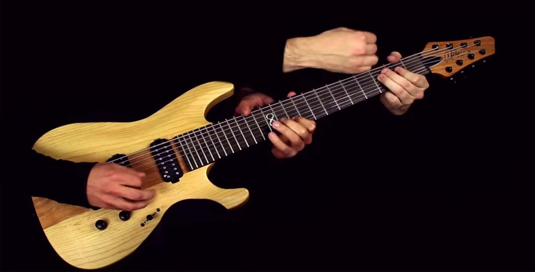 Tocando el tema "One" de Metallica en una sola guitarra a 6 manos. 3